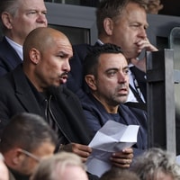 Nigel de Jong en Xavi Hernández