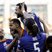 Het Nederlands elftal viert een doelpunt