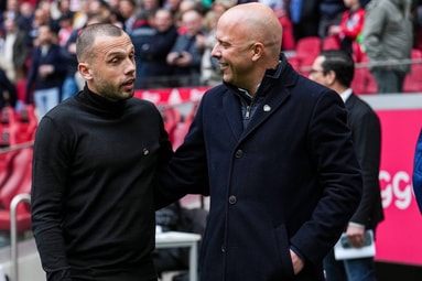 Arne Slot en John Heitinga 