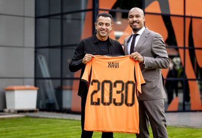 Nigel de Jong en Xavi Hernández