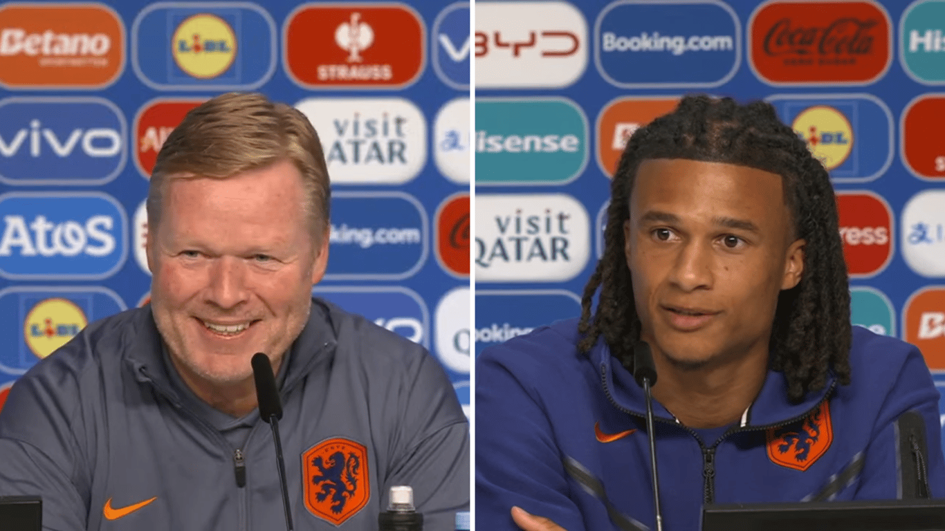 Ronald Koeman en Nathan Aké op een persconferentie van het Nederlands elftal
