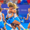 De hockeyvrouwen vieren een overwinning