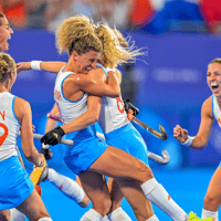 De hockeyvrouwen vieren een overwinning
