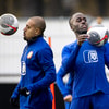 Donyell Malen (links) en Jordan Teze