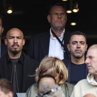 Nigel de Jong en Xavi Hernández