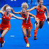 De hockeyvrouwen vieren een overwinning