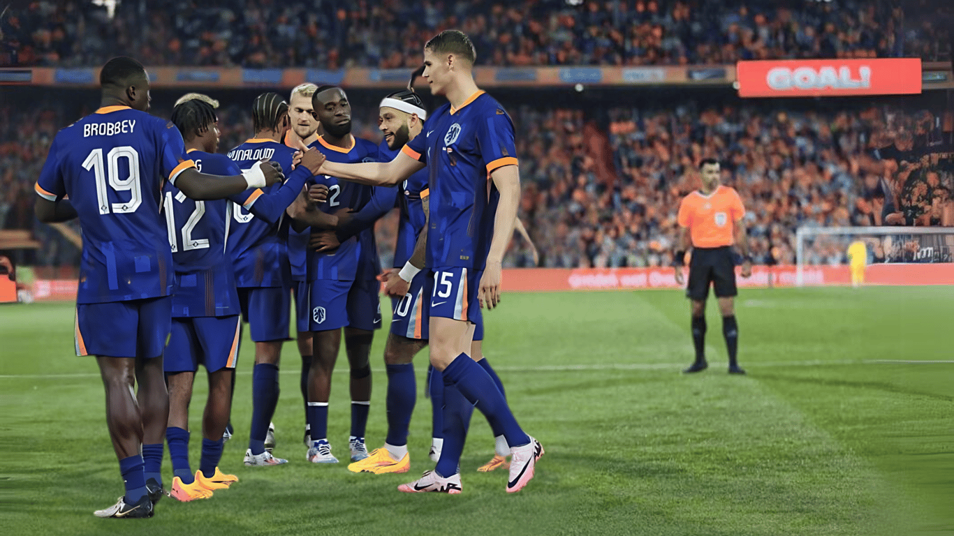 Het Nederlands elftal viert de 4-0 zege op Canada