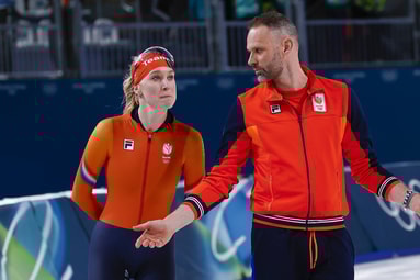 Merel Conijn met coach Arjan Samplonius 