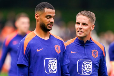 Cody Gakpo (links) en Joey Veerman
