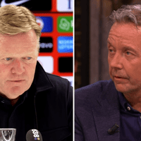 Bondscoach Ronald Koeman en journalist Valentijn Driessen